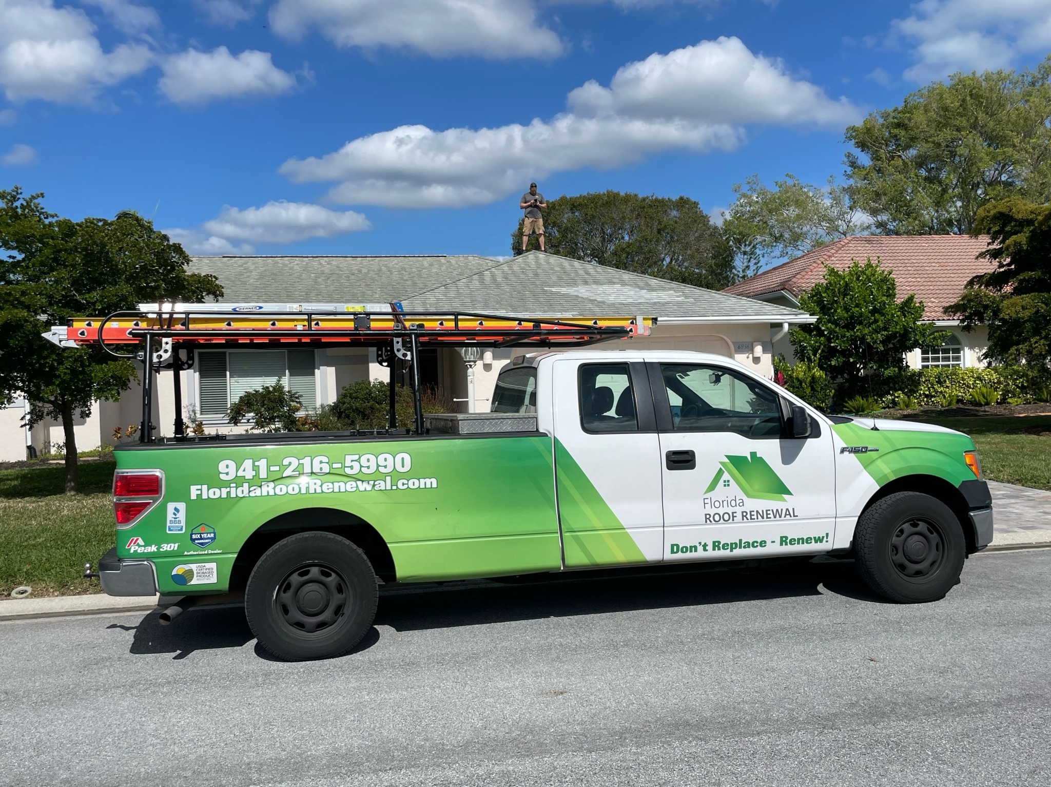 Florida Roof Renewal branded truck arriving at a customer home for inspection